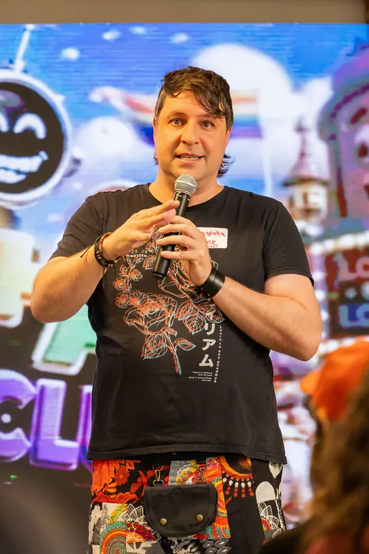 Showcase remarks and audience question in front of the Film Club screen, photo 167.