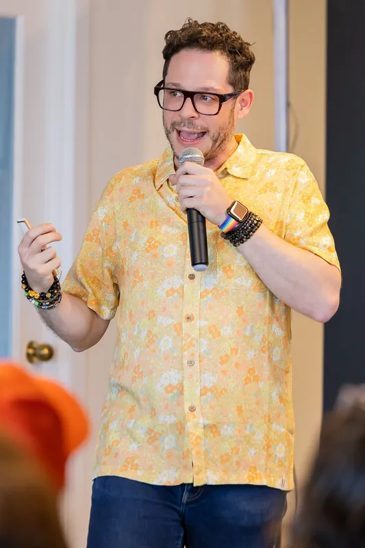 Presenter explaining a personhood slide and related technical details, photo 059.
