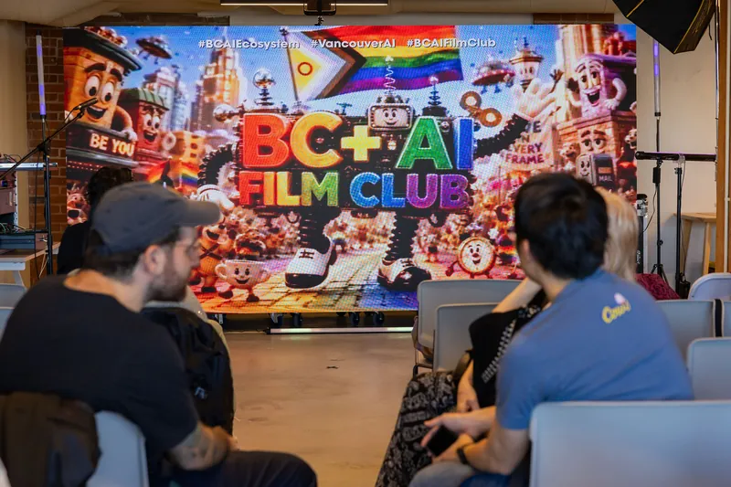 Audience watches an opening Film Club stage moment in front of the BC + AI backdrop, photo 018.