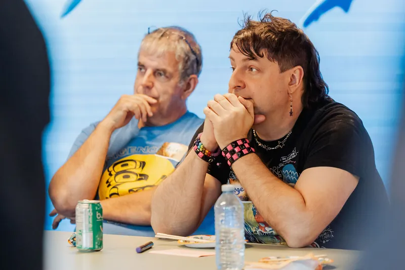 Participants listen and react during the workshop, photo 049.