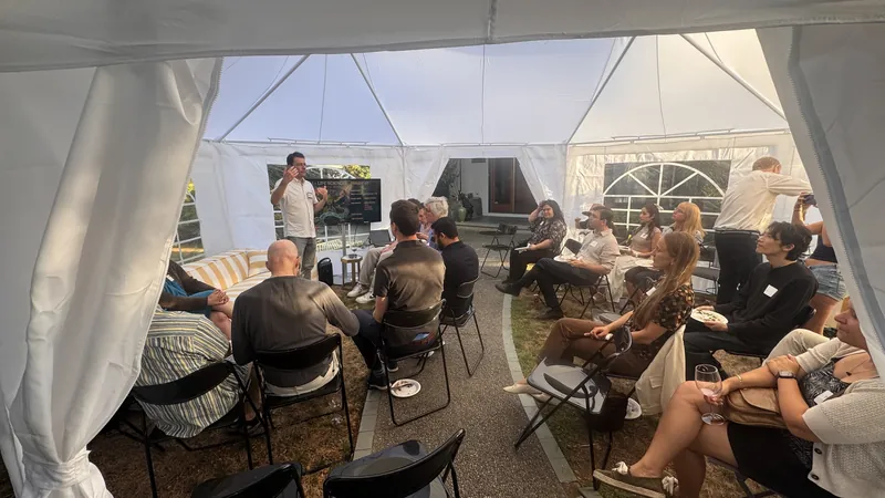 The August 11 presentation from the side of the tent.