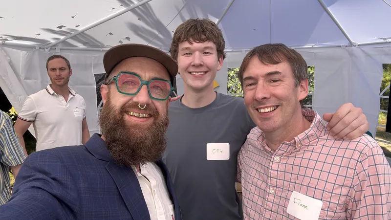 Guests posing together after arriving at the August 11 tent gathering.