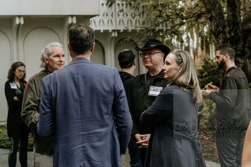 Conversations in the courtyard. Photograph by Michelle Diamond, September 30, 2026.