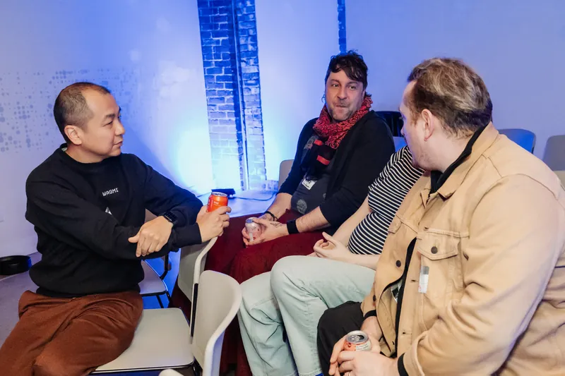 A small group discussion circle during the Film Club gathering.