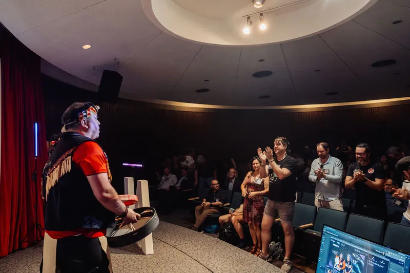 The Squamish Nation performer turns to face a warmly applauding crowd inside the Space Centre's circular theater.