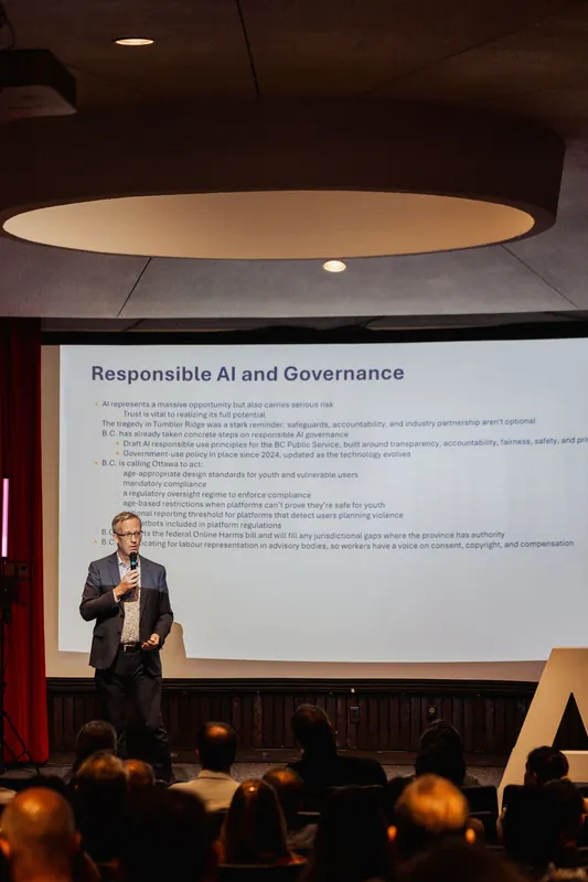 A packed house inside the planetarium dome watches the Responsible AI and Governance presentation.