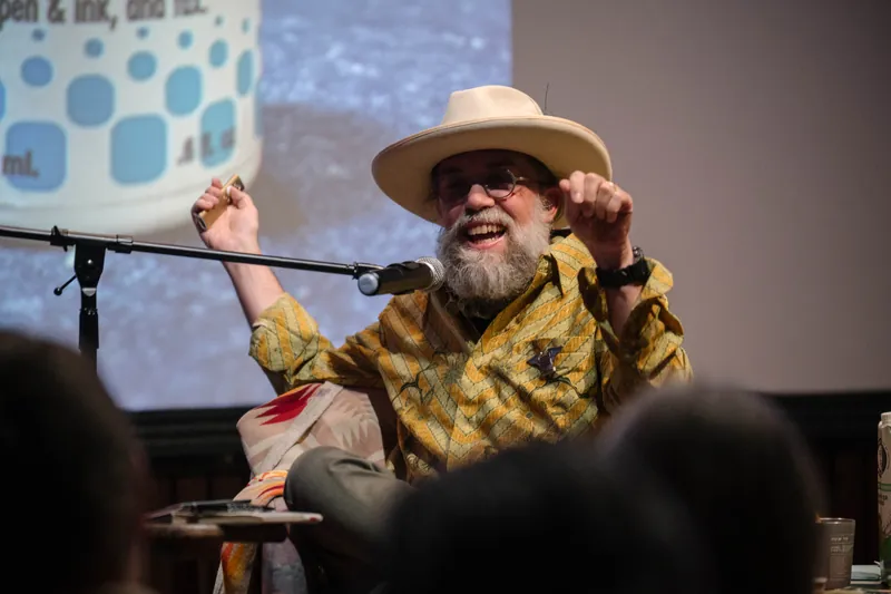 Dave Olson leans into storytelling — clippings, collages, and handwritten notes on screen.