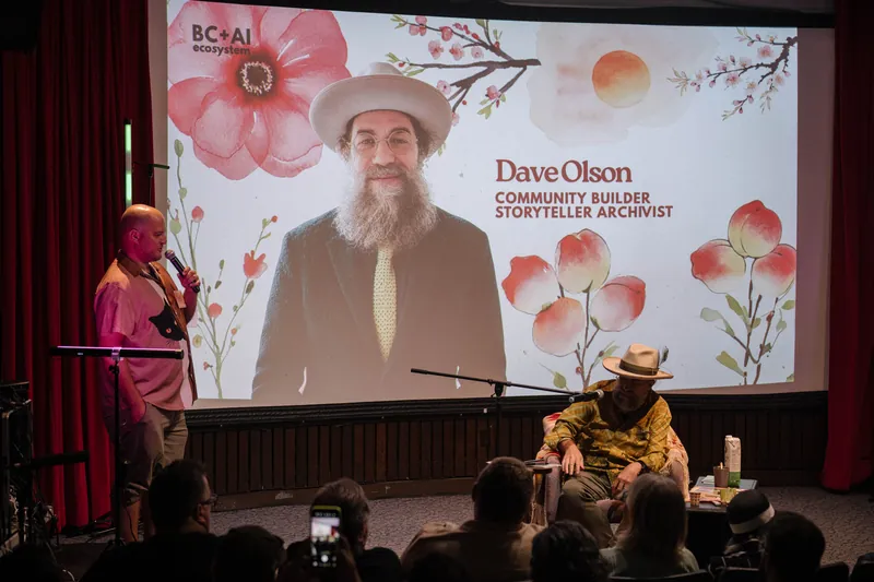 Dave Olson's intro slide — Community Builder, Creative Professional — fills the screen as the talk begins.