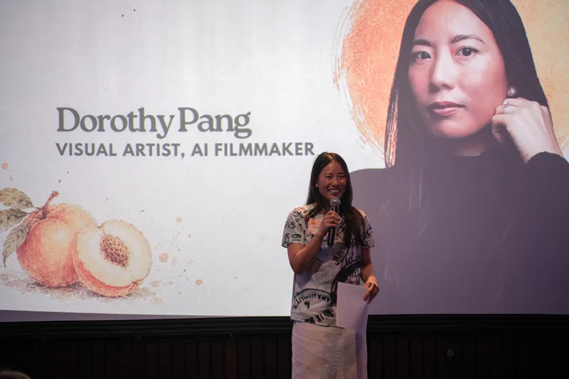 Dorothy Pang presents from the mic under her peach-illustrated intro slide.