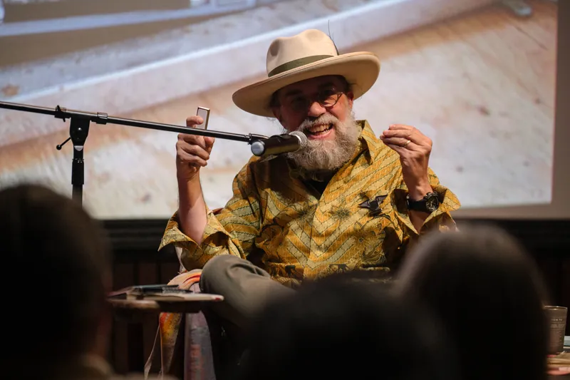 Dave Olson's slides dig into library work, notebooks, and found objects — Closer on the mic.