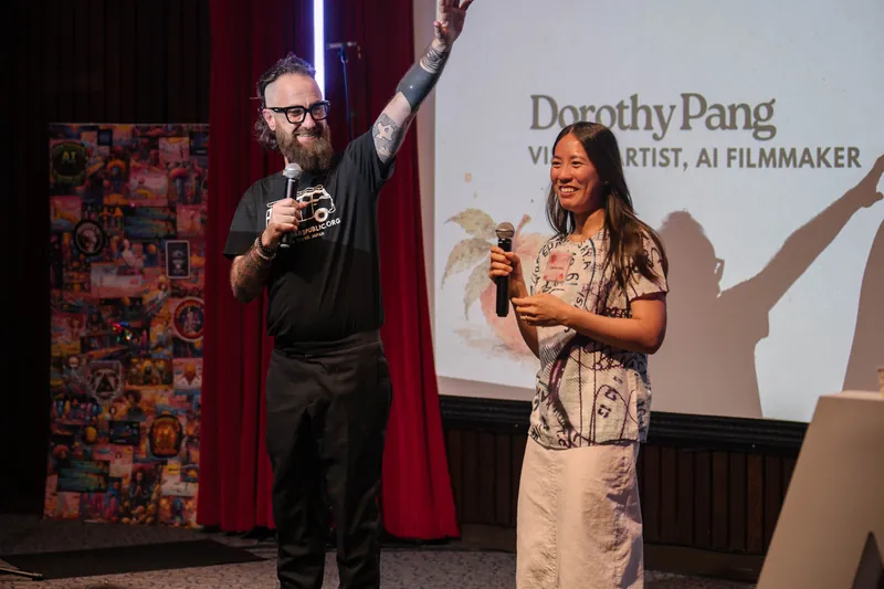 Dorothy Pang and a host share a brief exchange at the end of her talk.