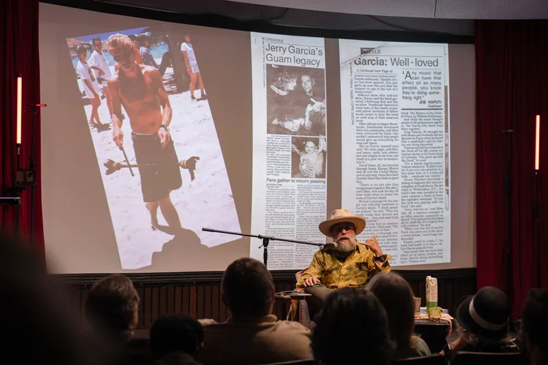 Dave Olson leans into storytelling — clippings, collages, and handwritten notes on screen — Wider angle.