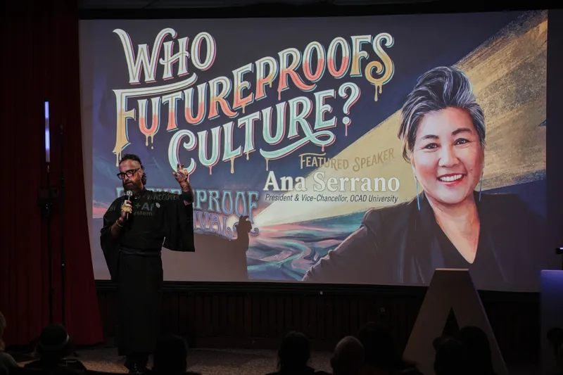 A Futureproof Festival slide introduces Sarah Downey and cultural futureproofing — Wider angle.