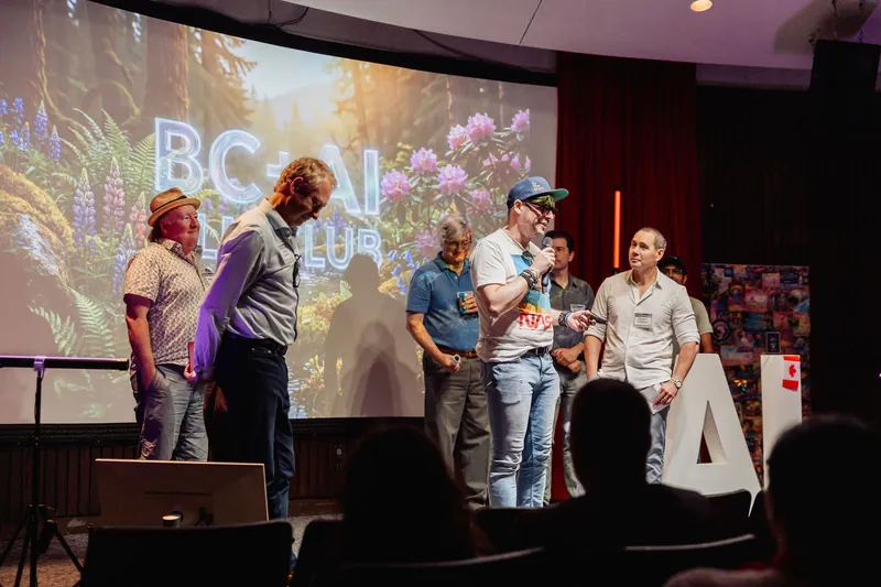 A community representative presents a BC + AI initiative alongside other organizers.