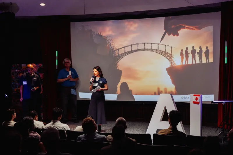 A Data for Good representative introduces a project with a sunset bridge image.