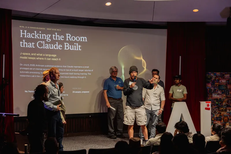 A group introduces the Hacking the Room that Claude Built initiative.