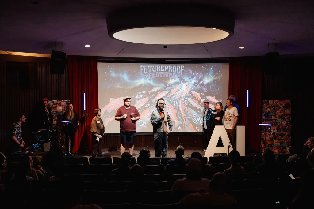 Vancouver AI community members gathered on stage during the May 2026 meetup runway.
