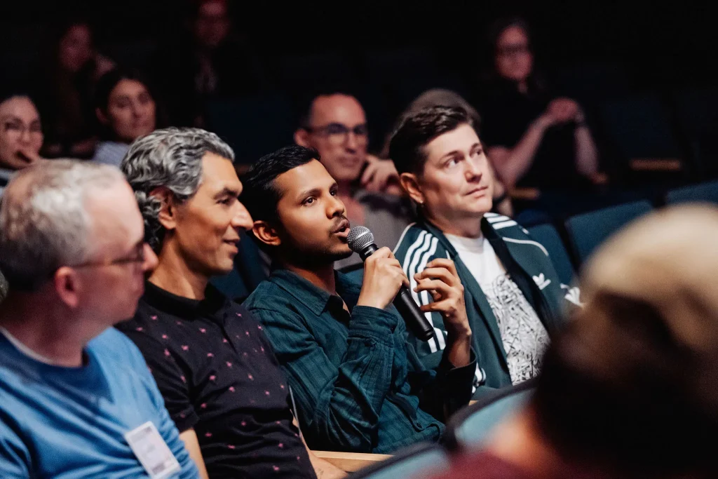Audience member asking Dr. Rachel Horst a question after her Vancouver AI keynote.